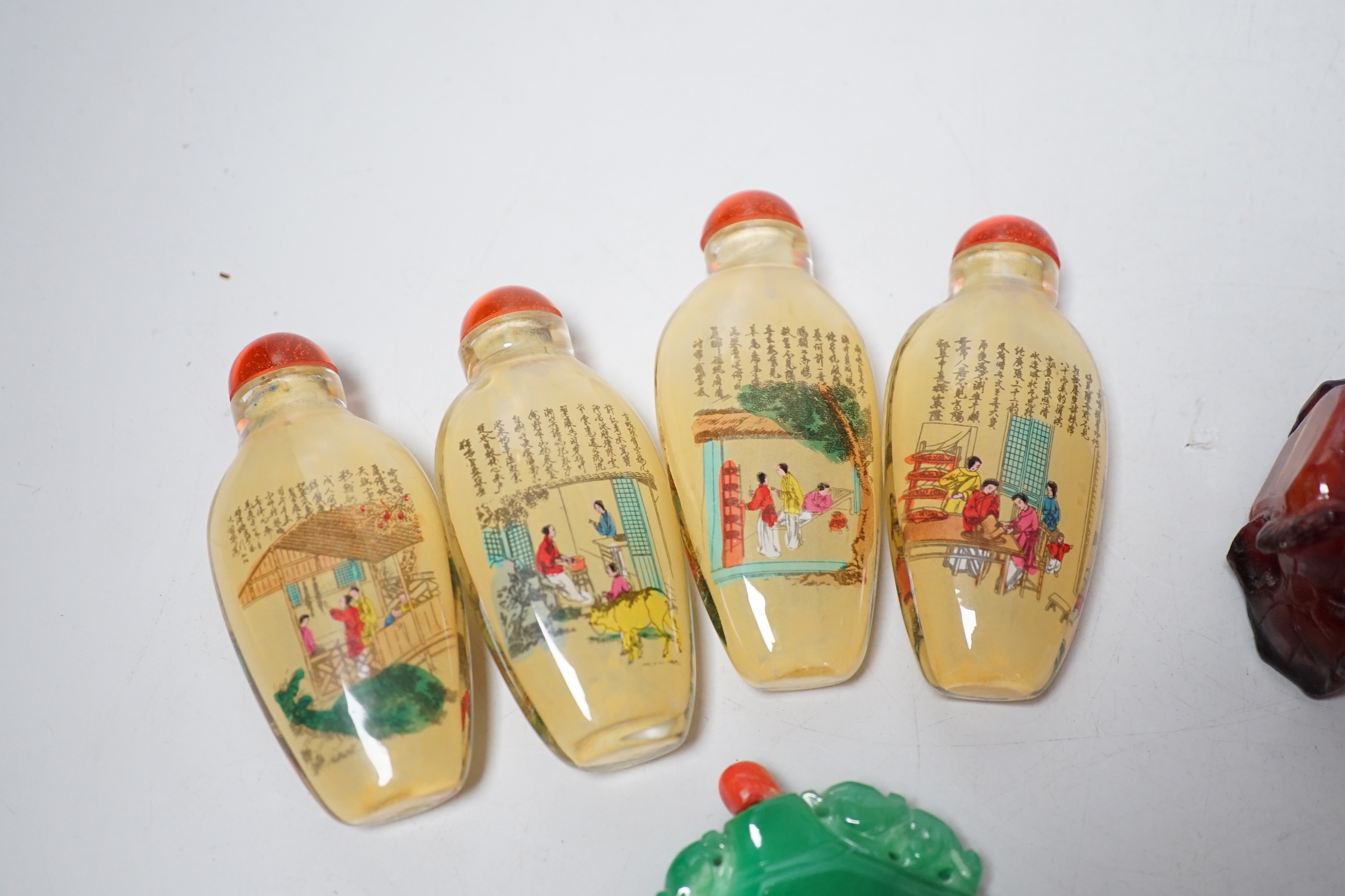 A group of Chinese snuff bottles, tallest 8.5cm including stopper